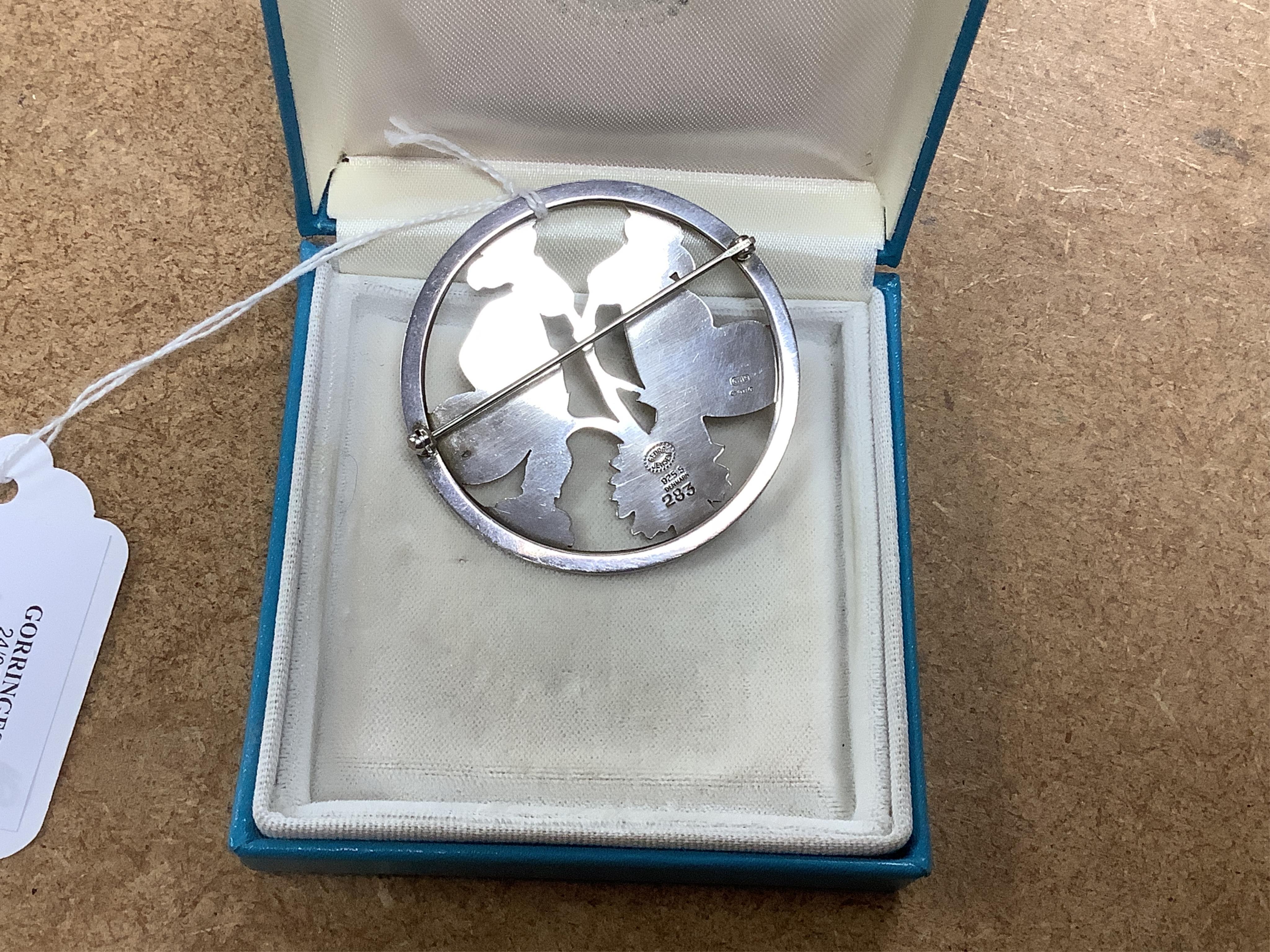 A Georg Jensen sterling moth and leaf circular brooch, design no. 283, 55mm, with Georg Jensen box. Condition - fair to good